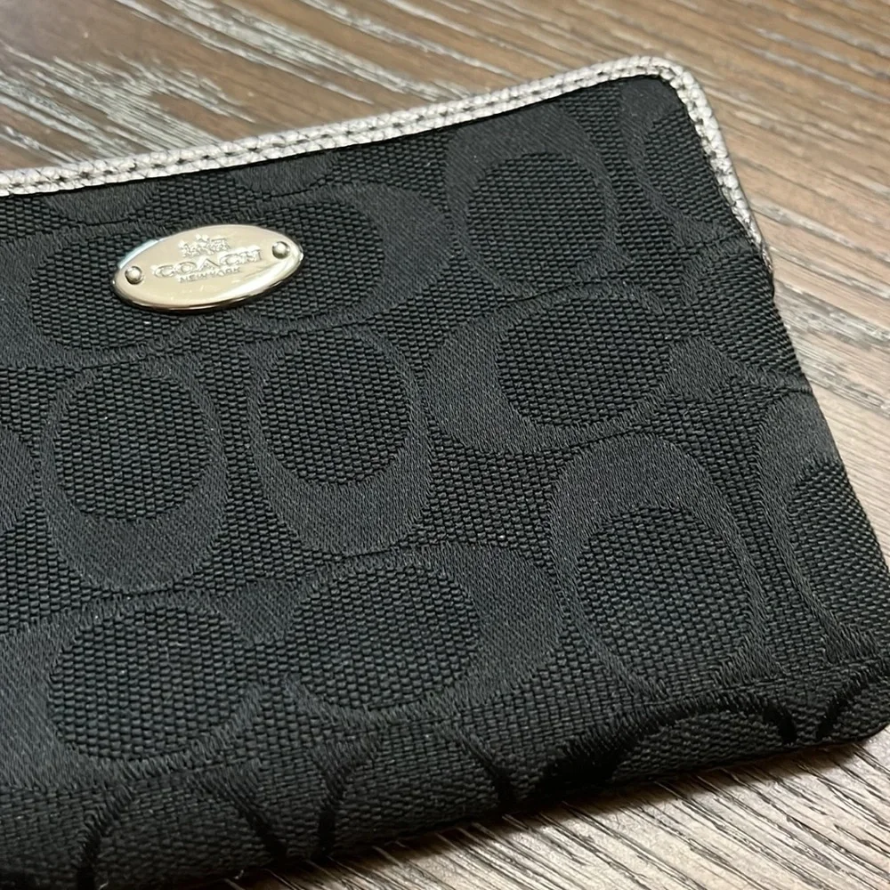 Coach black signature silver metallic leather edge wristlet
